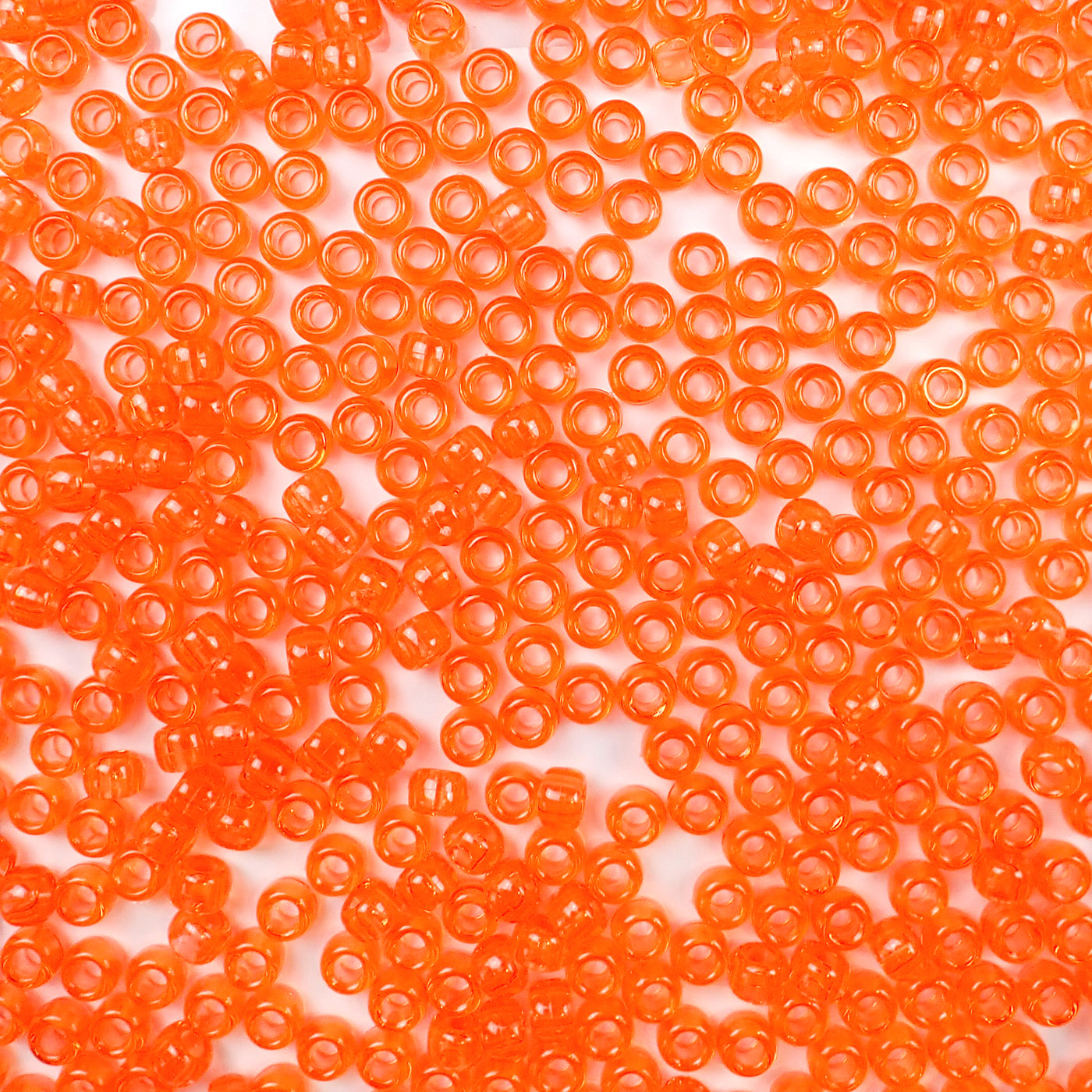 6 x 9mm plastic pony beads in dark transparent orange