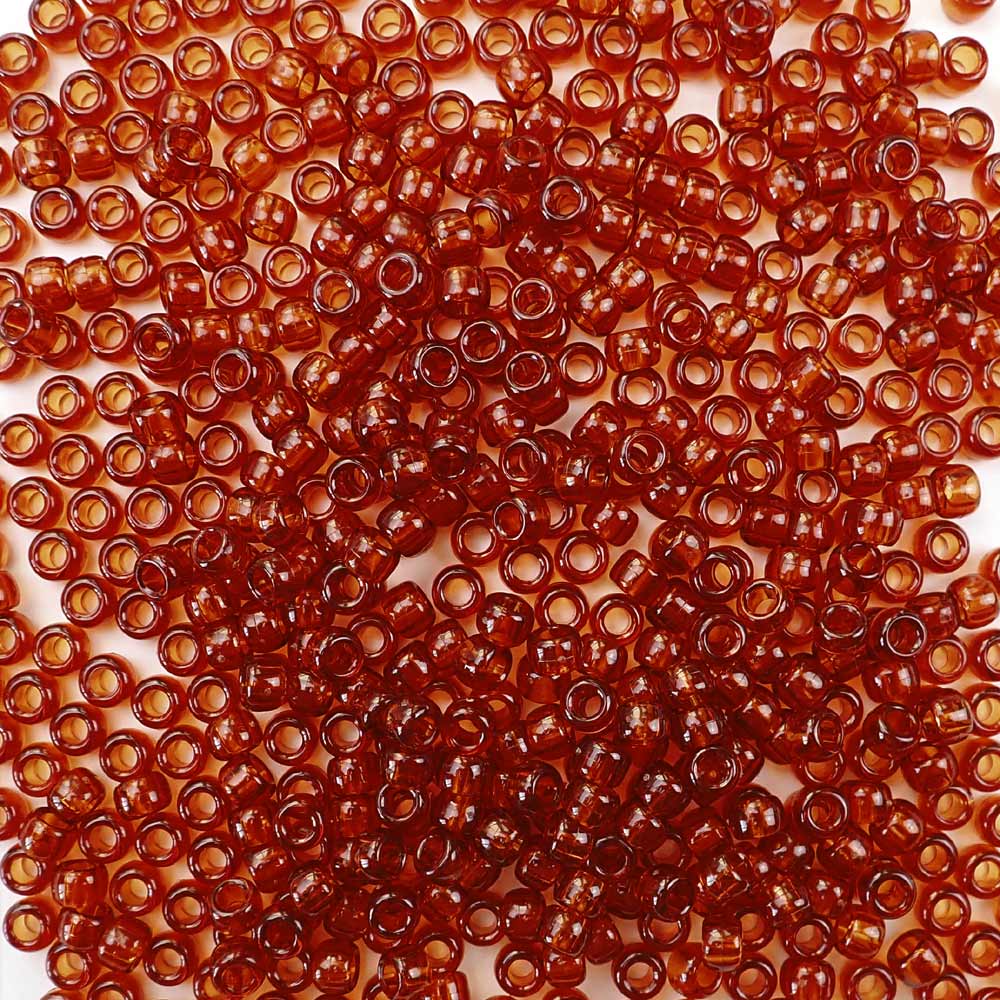 6 x 9mm plastic pony beads in transparent tortoise