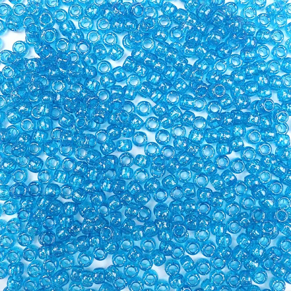 6 x 9mm plastic pony beads in turquoise glitter