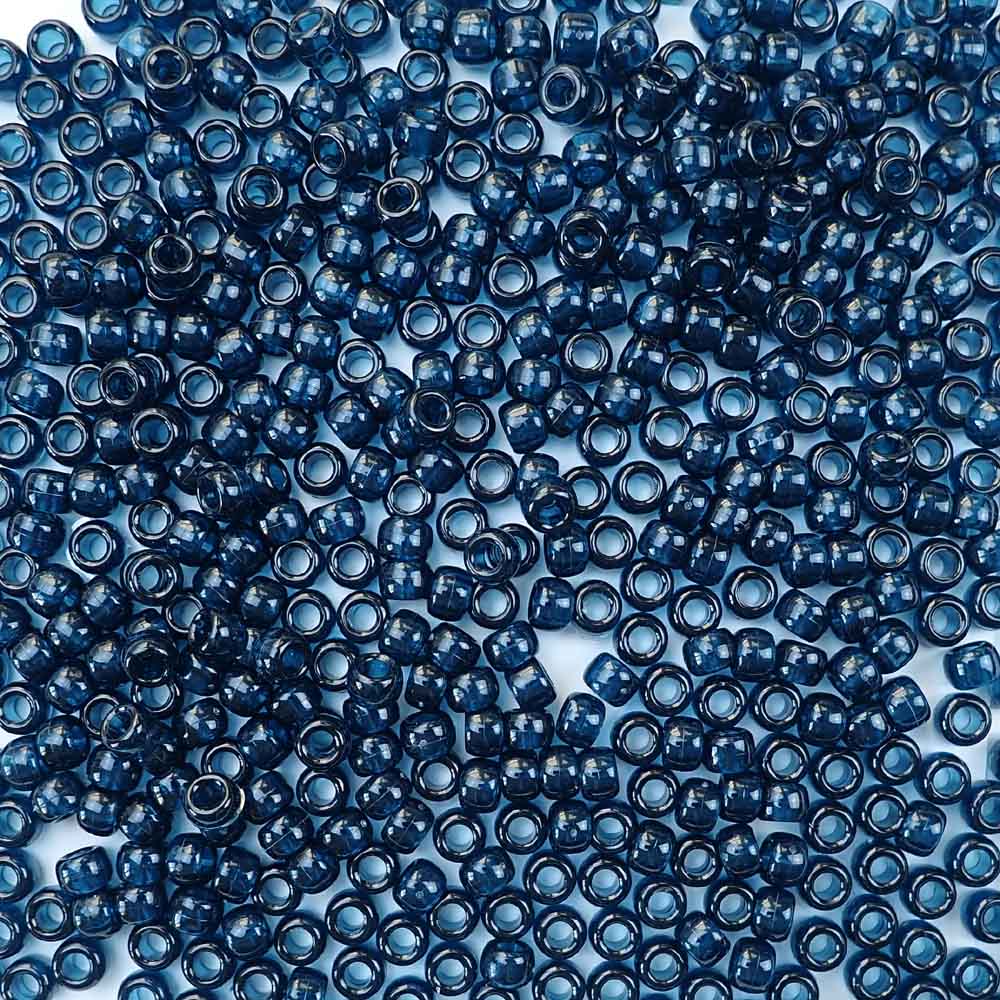 6 x 9mm plastic pony beads in transparent montana blue