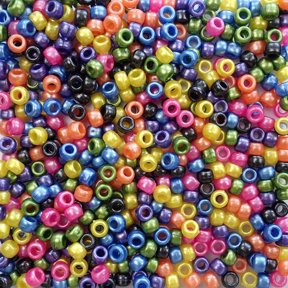 A mix of pony beads in dark pearlized colors