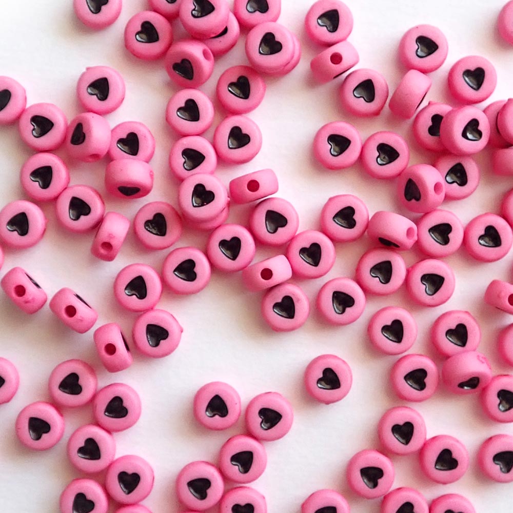 7mm Pink Round Plastic Beads w/ Black Hearts, about 100 beads