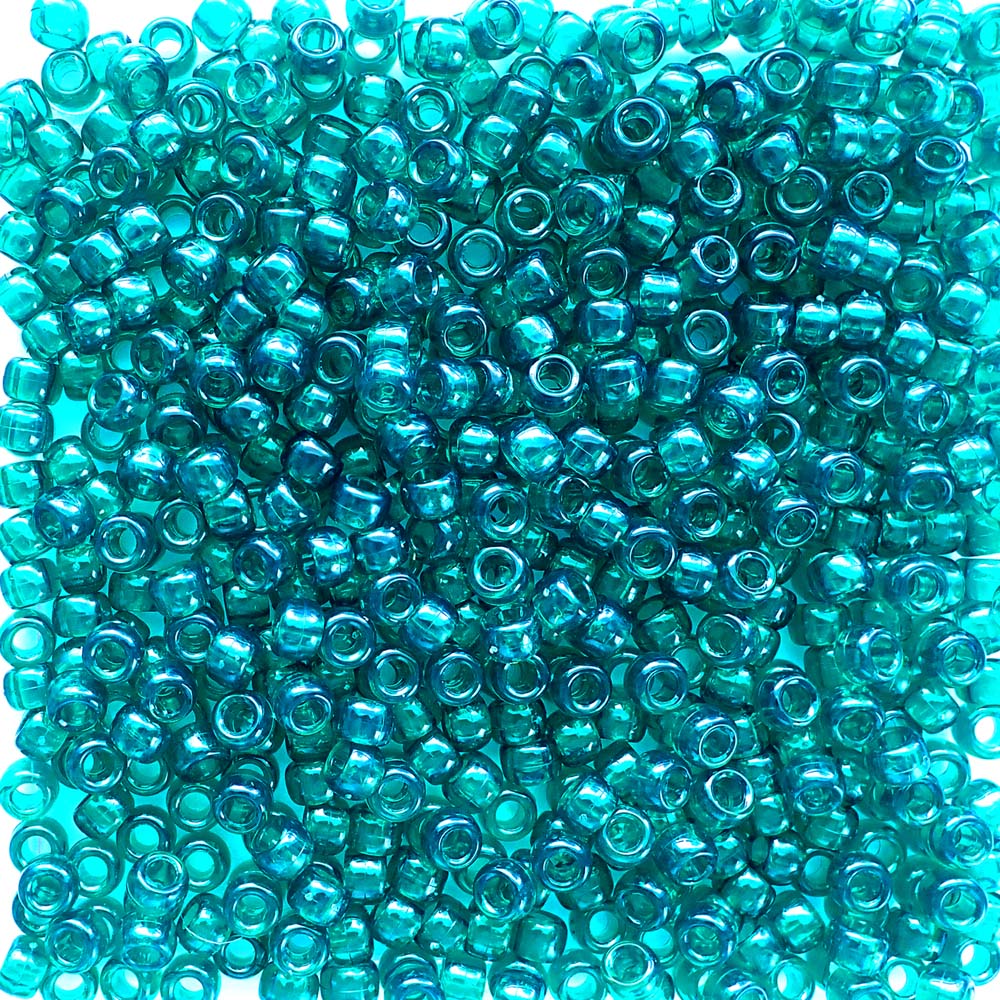 teal transparent colored plastic pony beads