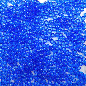 6 x 9mm plastic pony beads in transparent dark sapphire blue