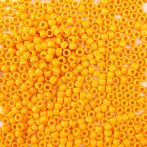 6 x 9mm plastic pony beads in a yellow orange goldenrod color