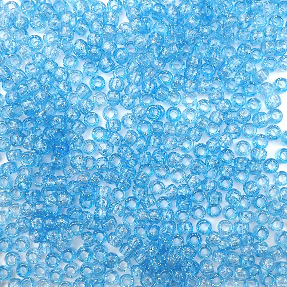 6 x 9mm plastic pony beads in light sapphire blue glitter