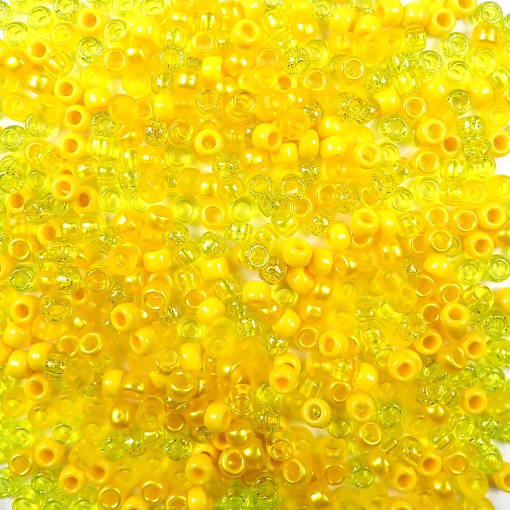 mix of yellow colors of 6 x 9mm plastic pony beads
