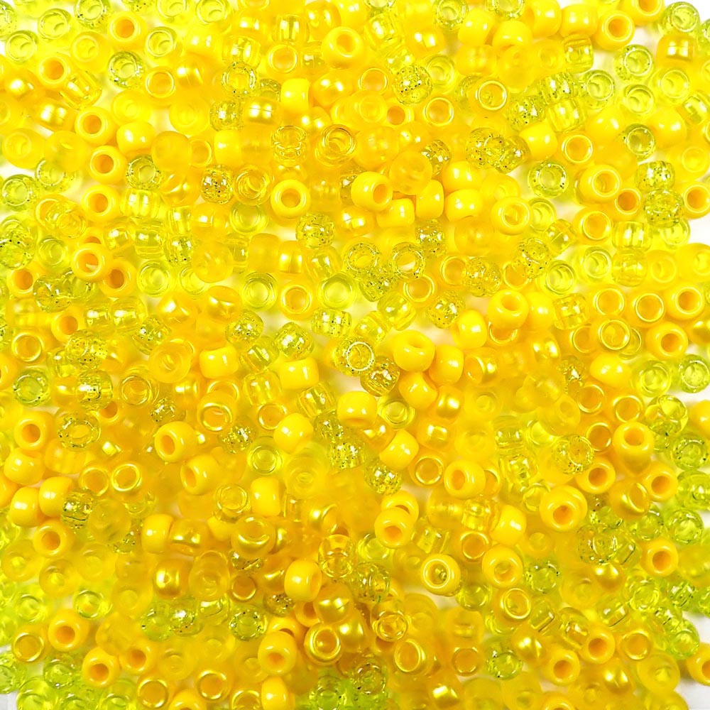 6 x 9mm plastic pony beads in a mix of yellow colors