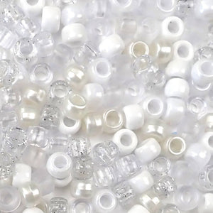a mix of white colors of 6 x 9mm plastic pony beads