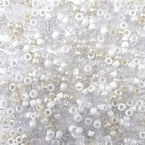 6 x 9mm plastic pony beads in a mix of white colors